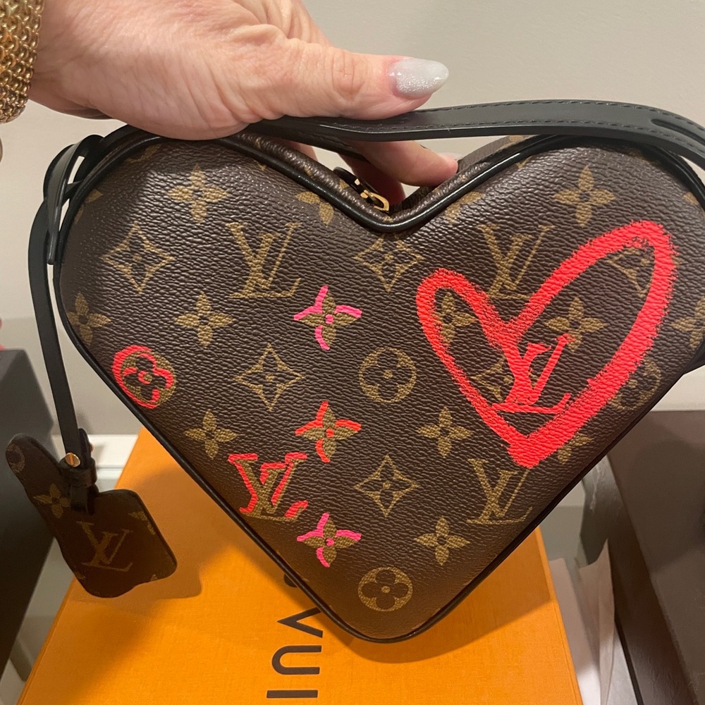 Louis Vuitton Sac Coeur Heart Bag.      Monogram Fall In Love